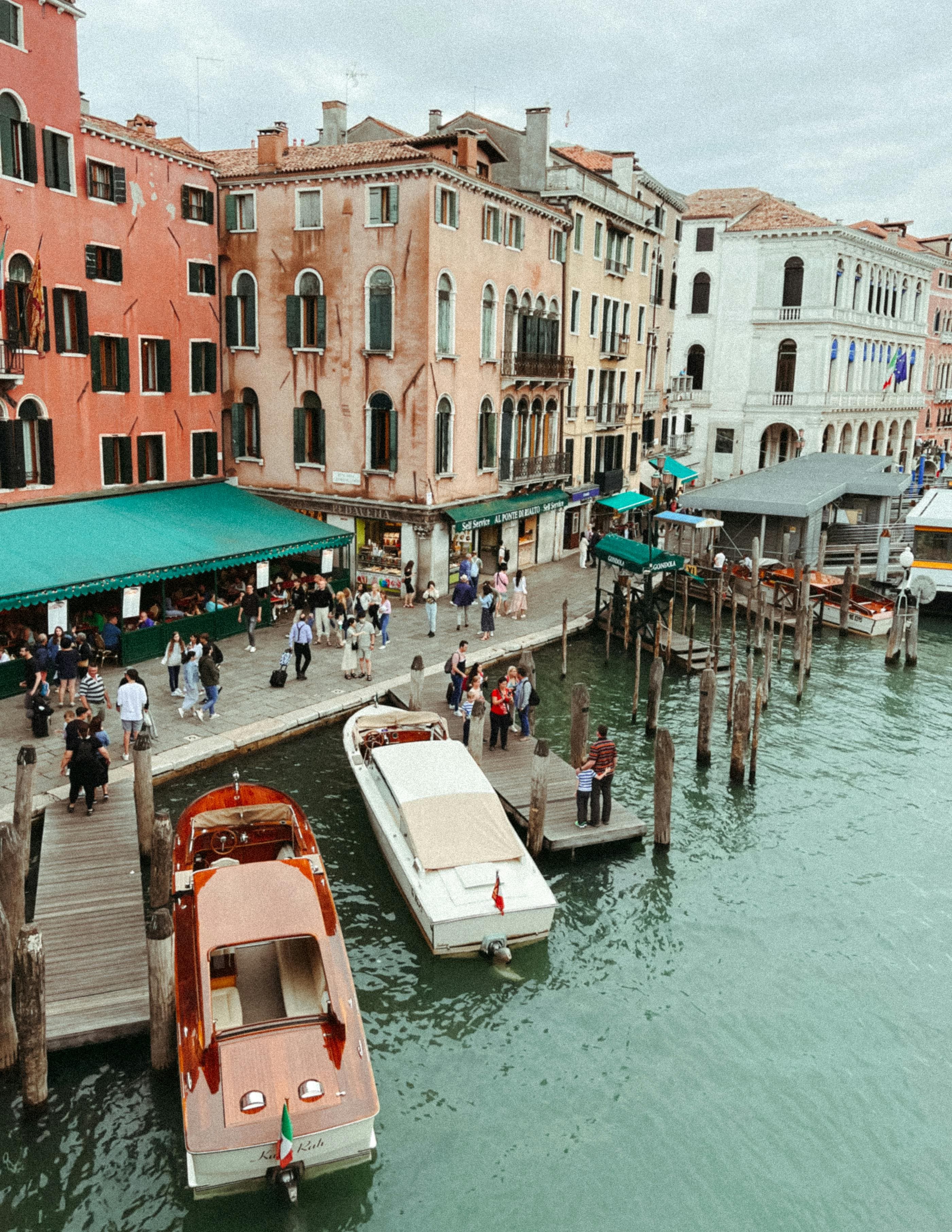 Venice canal with colorful buildings and boats